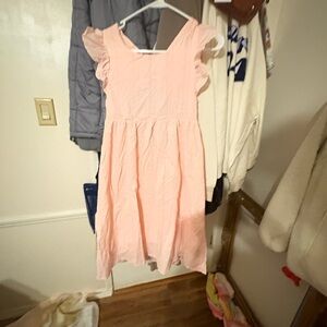 Peach Ruffled Kids Dress with gorgeous tie back